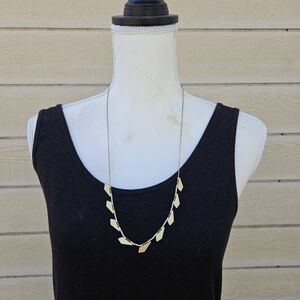 Madewell long gold tone chain with gold and silver angular pieces